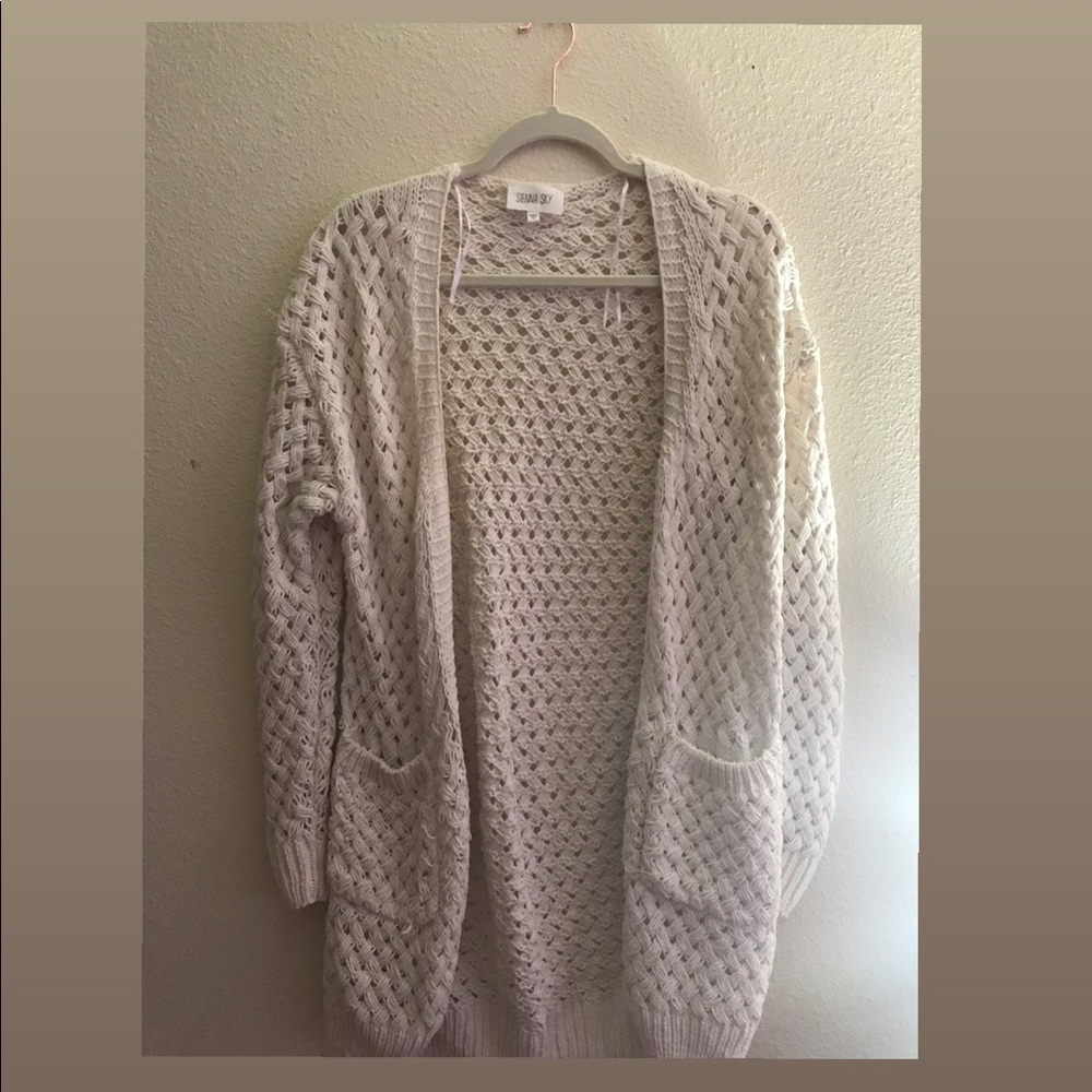 A Cream Colored Cardigan